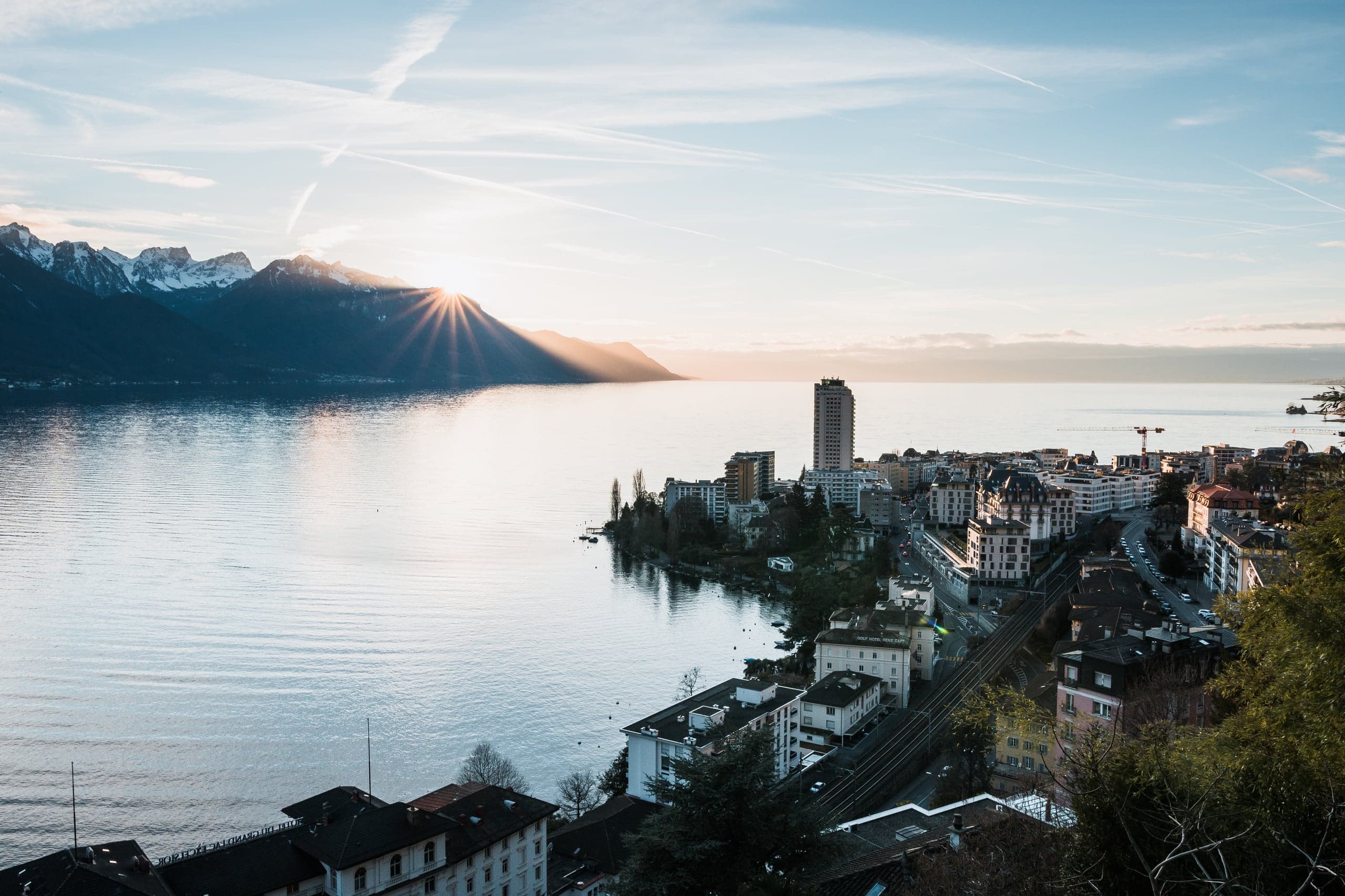 Sunset over Lake Geneva, the Alps and the lakeside town of Montreux